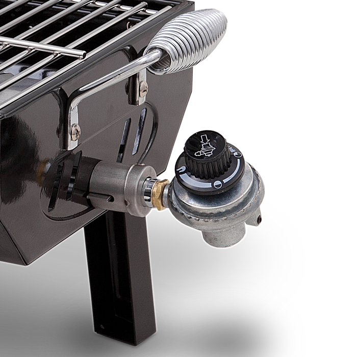 Black portable gas grill with adjustable control knob and coiled hose.