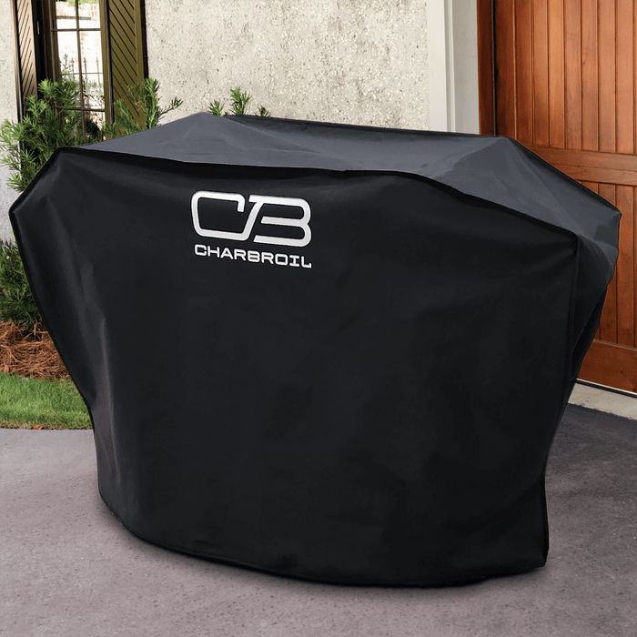Black Char-Broil grill cover with logo, outdoors.