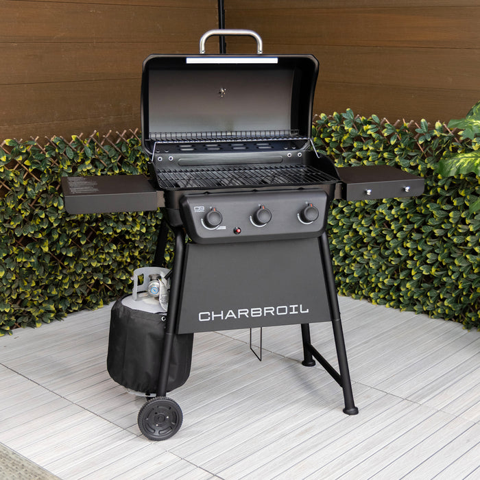 Black Char-Broil propane grill with side shelves and wheels.