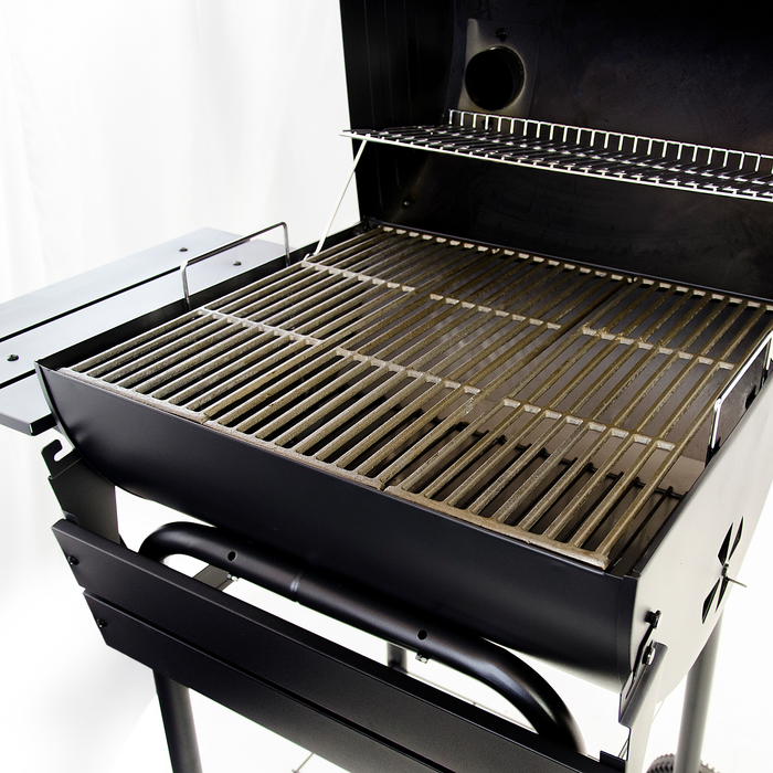 Black grill with dual cooking grates and side shelves.