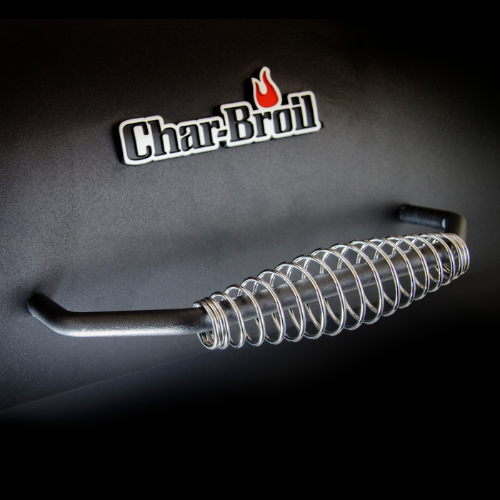 Black Char-Broil grill with spring-assisted lid handle.