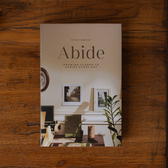 The Abide Hardcover study on a wooden table