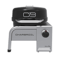 Char-Broil Bistro Pro tabletop grill with black lid, silver body, and control knob. Compact and portable design.