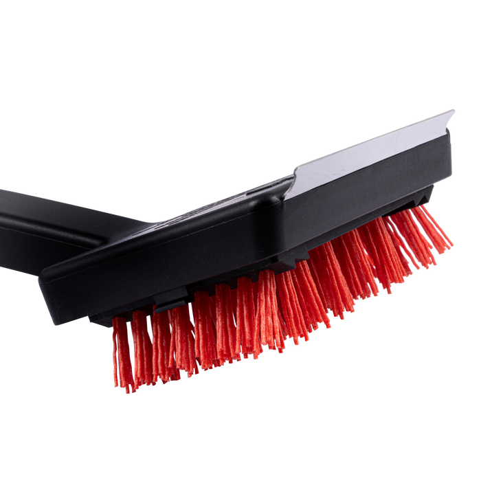Red brush attachment for vacuum cleaner with black plastic housing.
