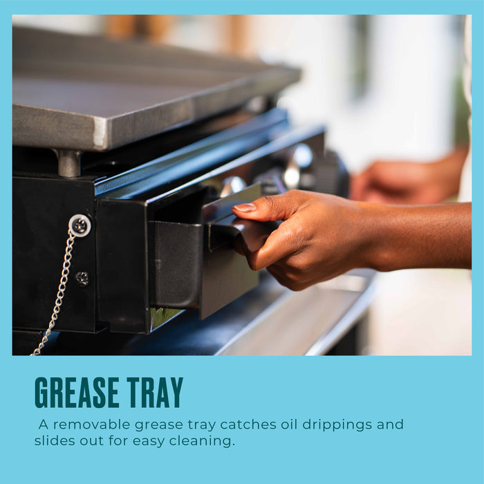 Black grease tray with sliding design for easy oil catch and removal.