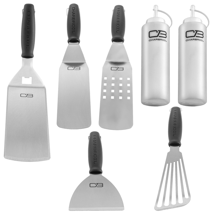 White Char-Broil kitchen tools set with spatulas, tongs, and basting bottles.