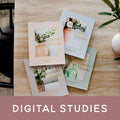Bible studies sitting on a wooden table with the words Digital Studies across the image.