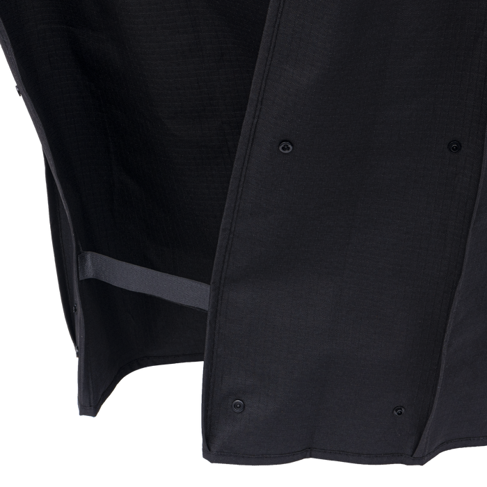 Black utility jacket with reflective strip and adjustable cuffs.