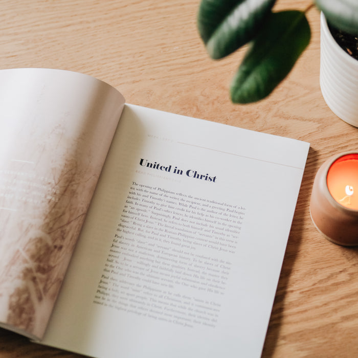 Fighting with Faith study opened to the United in Christ section on a wooden table