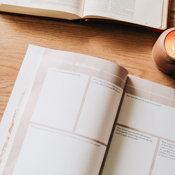 Fighting with Faith study opened to the Week One Reflection section on a wooden table