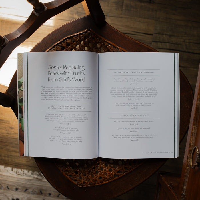 Fresh Start Bible study opened to the Bonus: Replacing fears with truths from God's word page on a woven chair