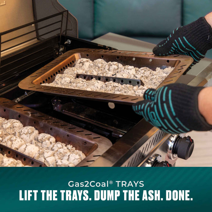 "Brown ceramic grill trays with charcoal, lifted for cleaning or reloading."