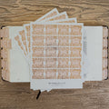 Bible Tabs spread over a bible on a wooden background