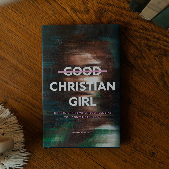 The Good Christian Girl Book cover on a wooden table