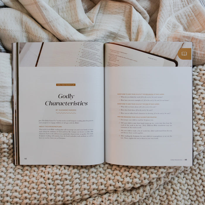 Gospel at Home Issue 9 Magazine opened to Godly Characteristics page on two blankets, one that is knitted and one that is smooth