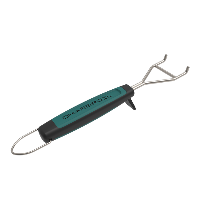 Teal and black Char-Broil grill cleaning tool with metal prongs.