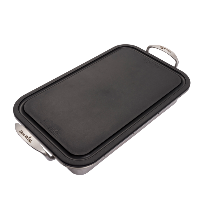 Black Char-Broil griddle with stainless steel handles.