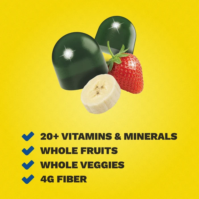 Dark green gummy capsules with a strawberry and banana slice, listing product benefits: 20+ vitamins and minerals, whole fruits, whole veggies, and 4g fiber