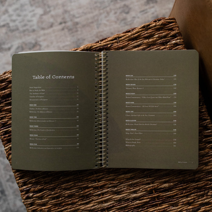 In Christ Alone Mens Study opened to the Table of Contents on an woven box