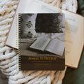 Jesus is Better study cover laying on an open bible on a white knitted blanket