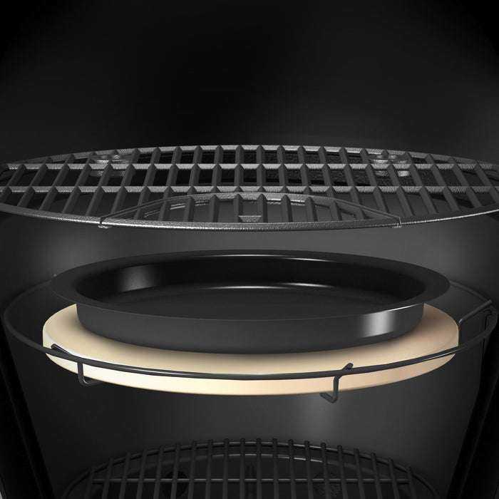 Black circular speaker with grill and beige surround.