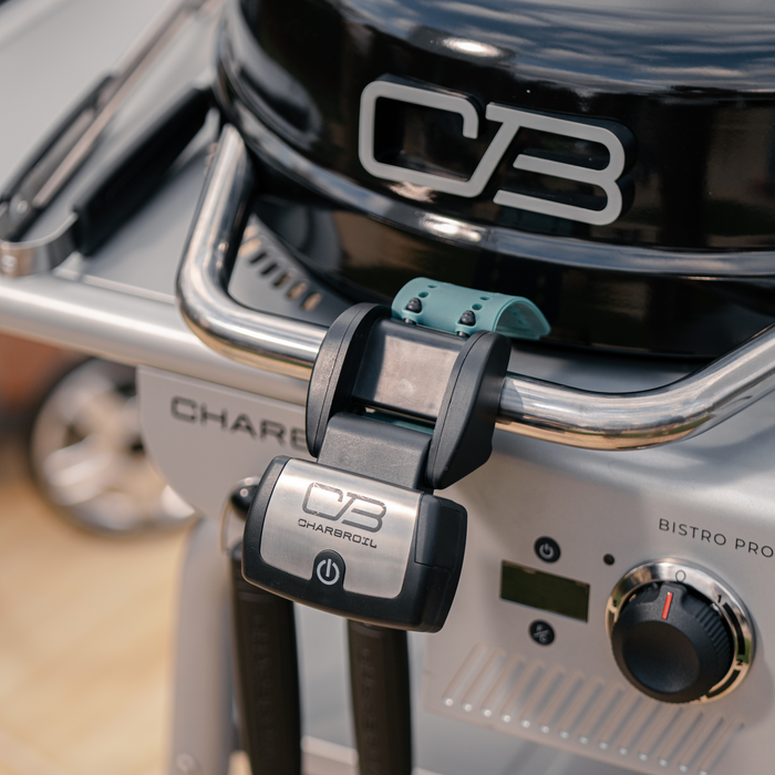 Silver Char-Broil Bistro Pro electric grill with charcoal mode.