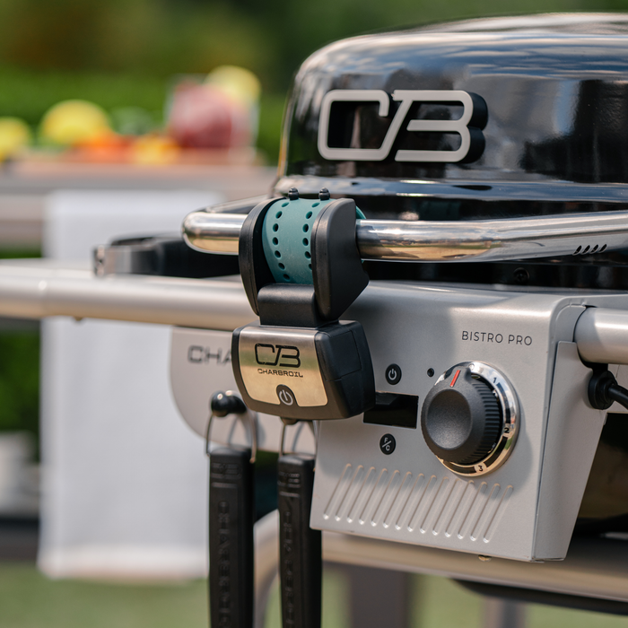 Silver Char-Broil Bistro Pro electric grill with charcoal mode.