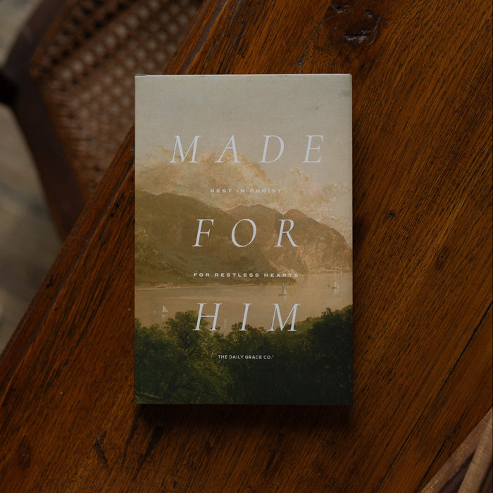 Made for Him book cover on a wooden table near a chair