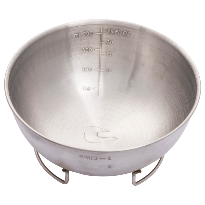 Silver stainless steel measuring cup with 3-cup capacity and milliliter/ounce markings.