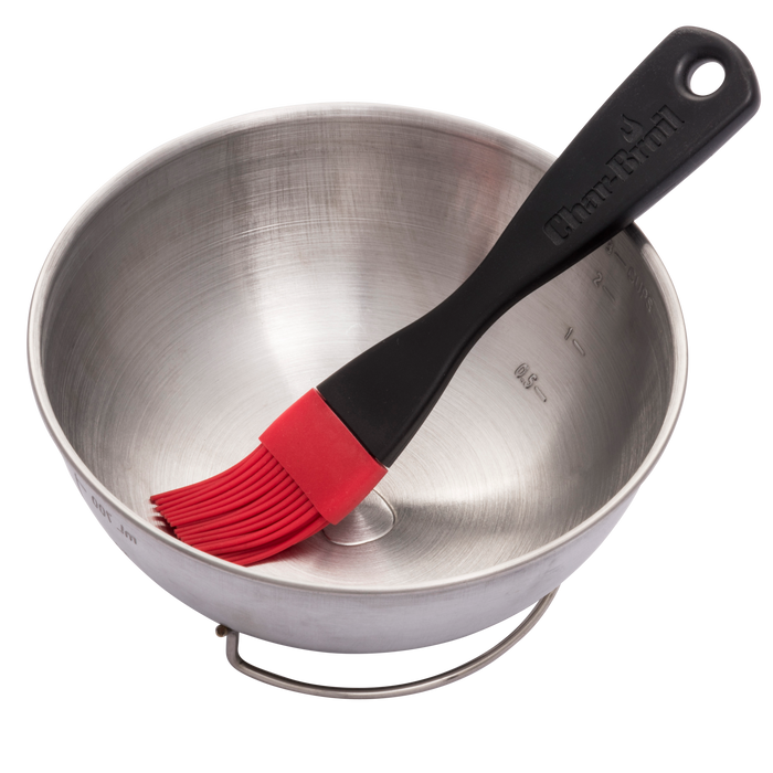 Silver Char-Broil mixing bowl with black handle and red silicone brush inside.