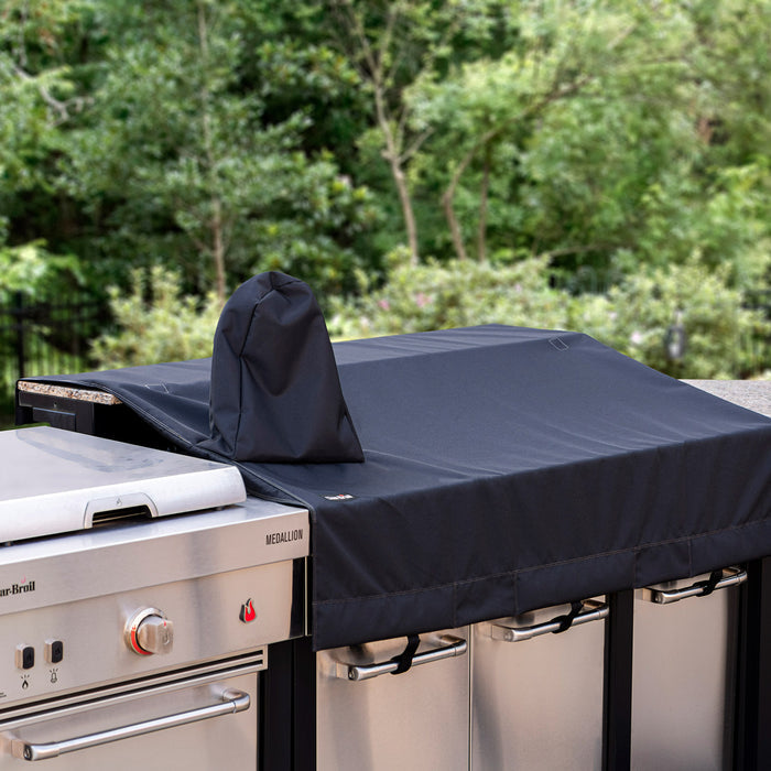 Dark blue Medallion grill cover on stainless steel Char-Broil grill.