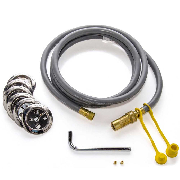 Gas hose kit with brass fittings, caps, and wrench.