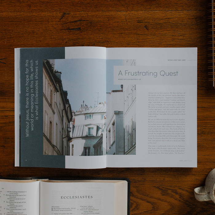 The Path to Purpose opened to the Week One Day One page on a wooden table near an open bible