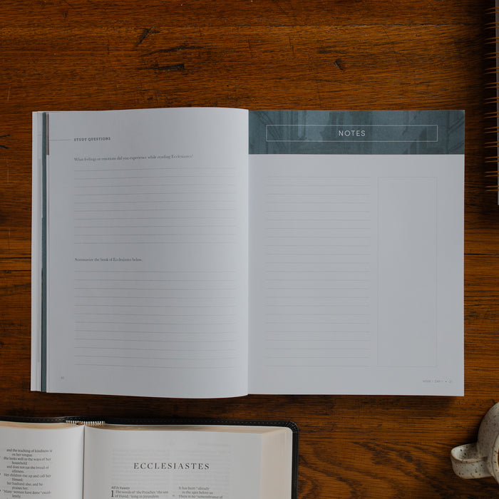 The Path to Purpose opened to the Notes page on a wooden table near an open bible