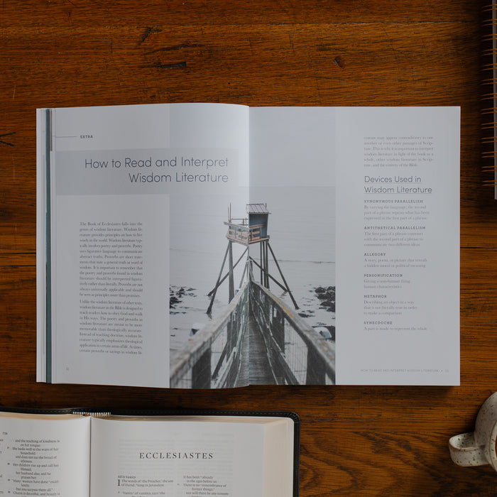 The Path to Purpose opened to the Extra page on a wooden table near an open bible
