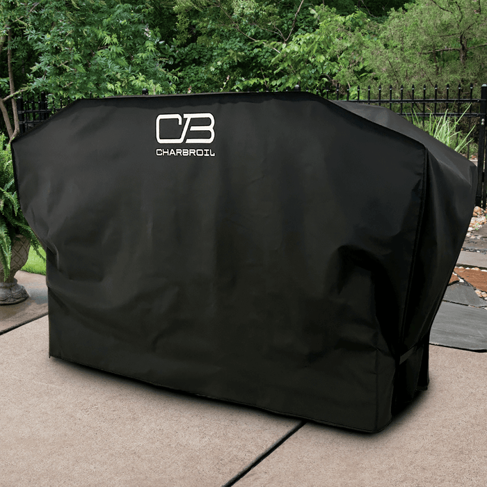 Black Char-Broil grill cover with logo, outdoor setting.