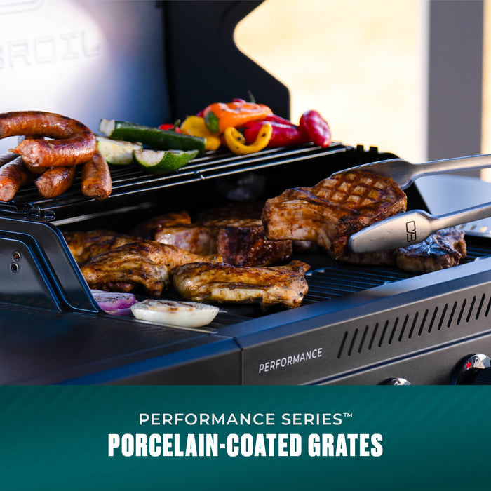 Black Performance Series grill cooking sausages, steak, vegetables, and tofu.