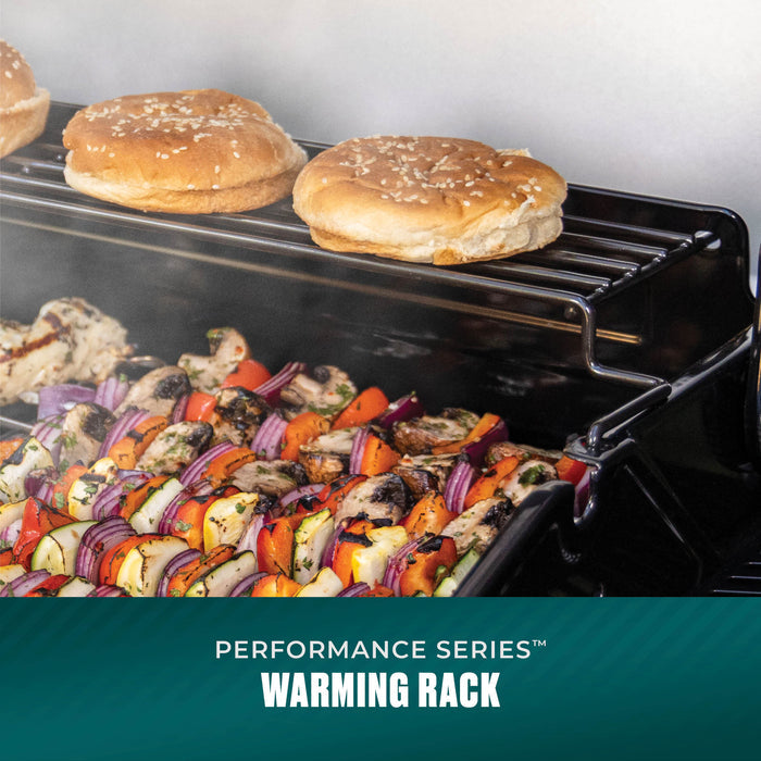 Black Performance Series warming rack with buns and grilled vegetables.
