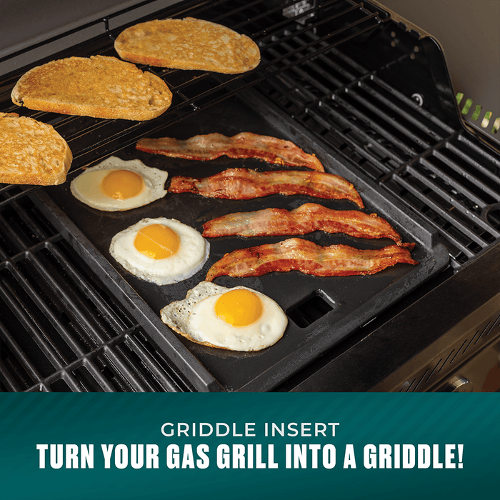 Black griddle insert for gas grill, cooking eggs, bacon, and toast.