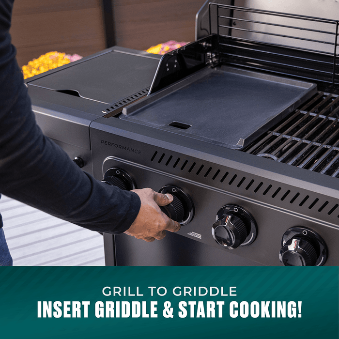 "Performance grill with griddle insert and control knobs."