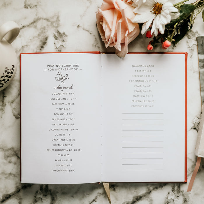 a red leatherette journal for motherhood
