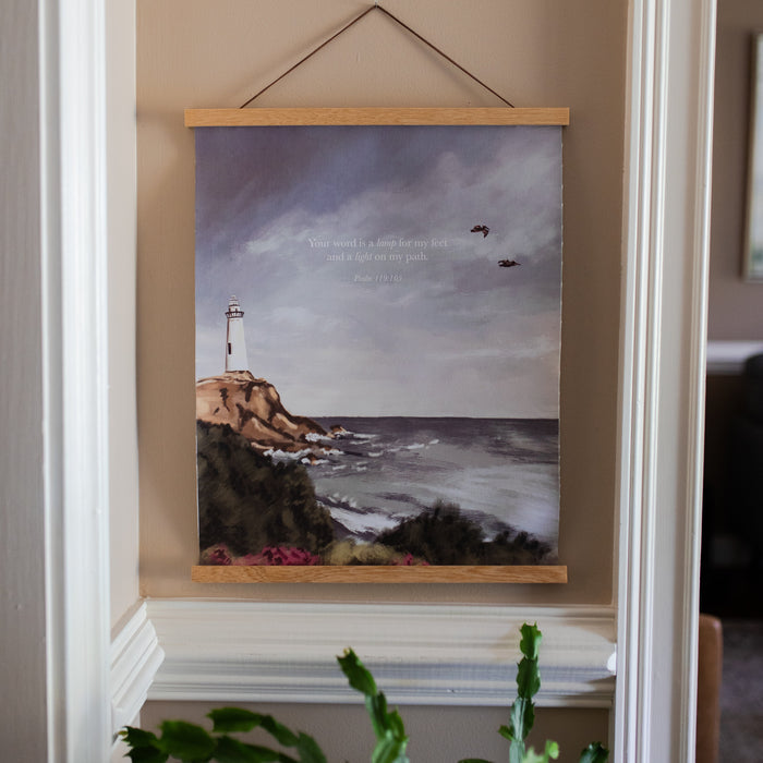Psalm 119 Lighthouse Painting Print on a light colored wall with white trim