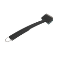 Black grill cleaning brush with metal bristles, scraper edge, and hanging loop. Ideal for BBQ maintenance.