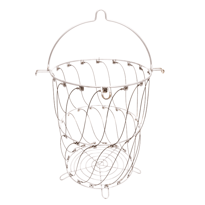Silver wire basket with a round base, spiral sides, and a curved handle. Ideal for holding or carrying items.