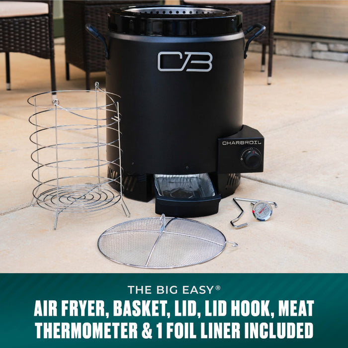 Char-Broil air fryer with basket, lid, hook, meat thermometer, and foil liner. Black, cylindrical design.