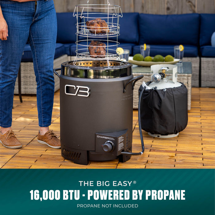 Char-Broil Big Easy propane grill, 16,000 BTU, black barrel design with wire cooking racks. Propane tank not included.