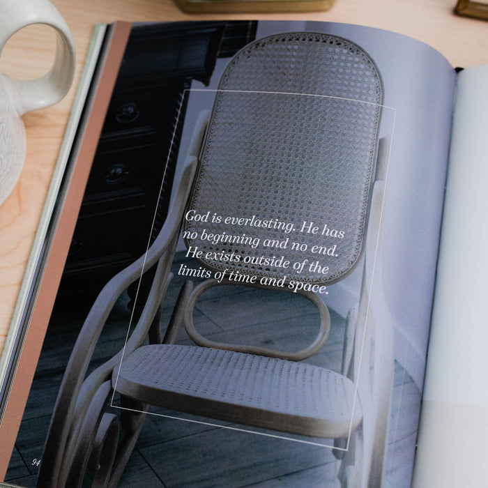 Coffee table book open to photo with a quote on the page
