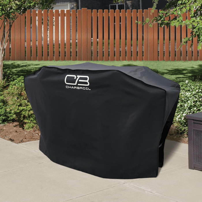 Black Char-Broil grill cover on patio.