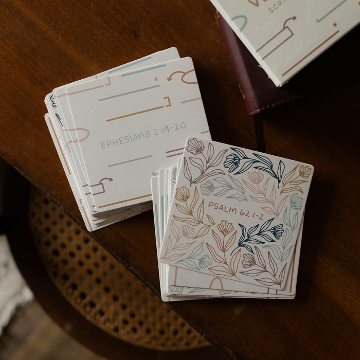 The Verse Map cards stacked on a wooden table in two stacks