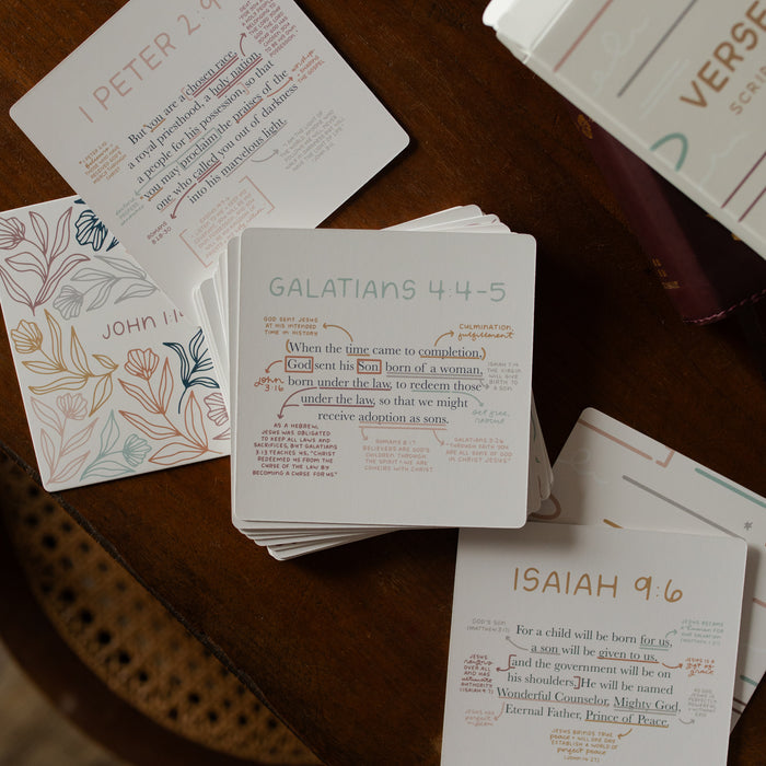 Multiple stacks of the Verse Map Scripture cards on a wooden table